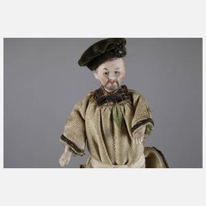 Vier Puppenstubenpuppen