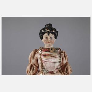 Vier Puppenstubenpuppen