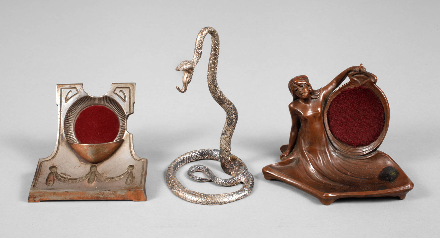 Drei Taschenuhrenhalter