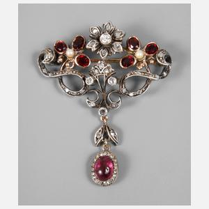 Filigrane Brosche mit Rubin, Granat und Diamanten