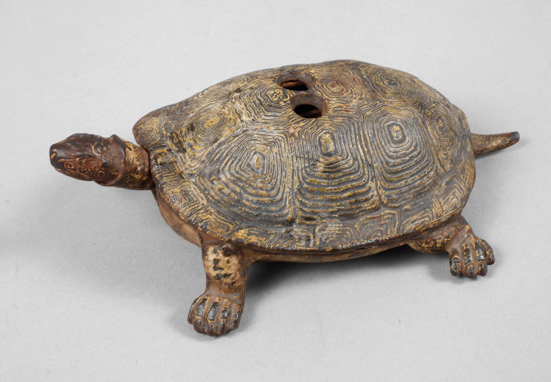 Figürlicher Zigarettenabschneider