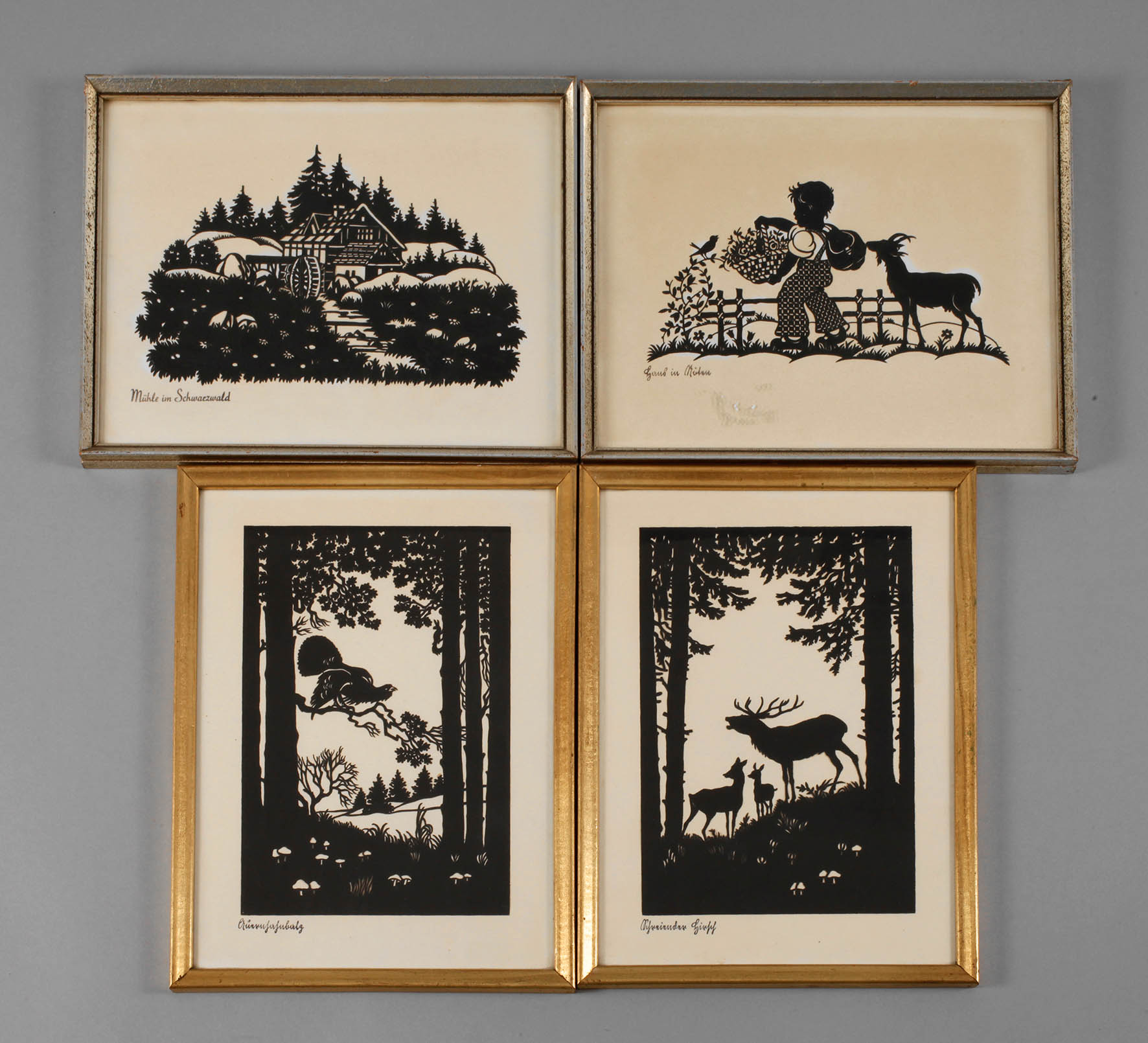 Vier Scherrenschnitte