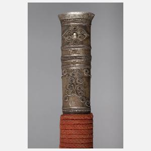 Zwei silbermontierte Dha