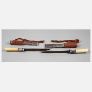 Zwei silbermontierte Dha