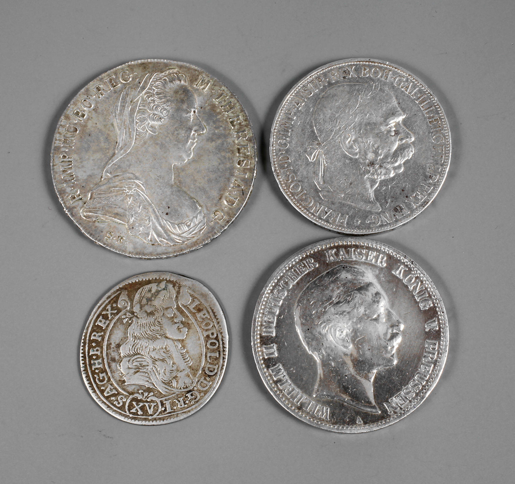 Vier Silbermünzen