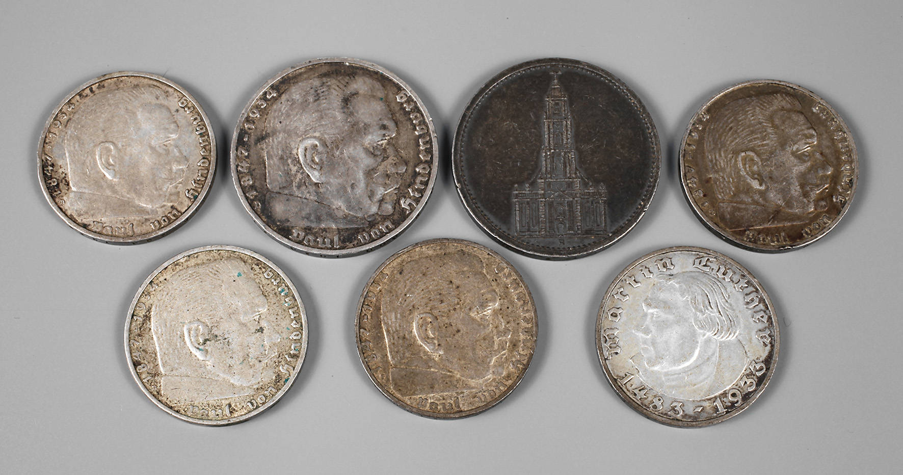 Sieben Münzen III. Reich