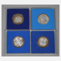 Vier Münzen DDR111