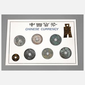 Sechs Lochmünzen China