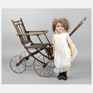 Kestner große Porzellankopfpuppe mit Puppenwagen