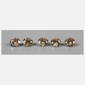 Fünf Brillanten getönt, gesamt 0,74 ct