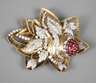 Blütenbrosche mit Rubinen und Brillanten