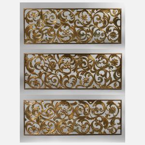 Drei Heizkörperverkleidungen