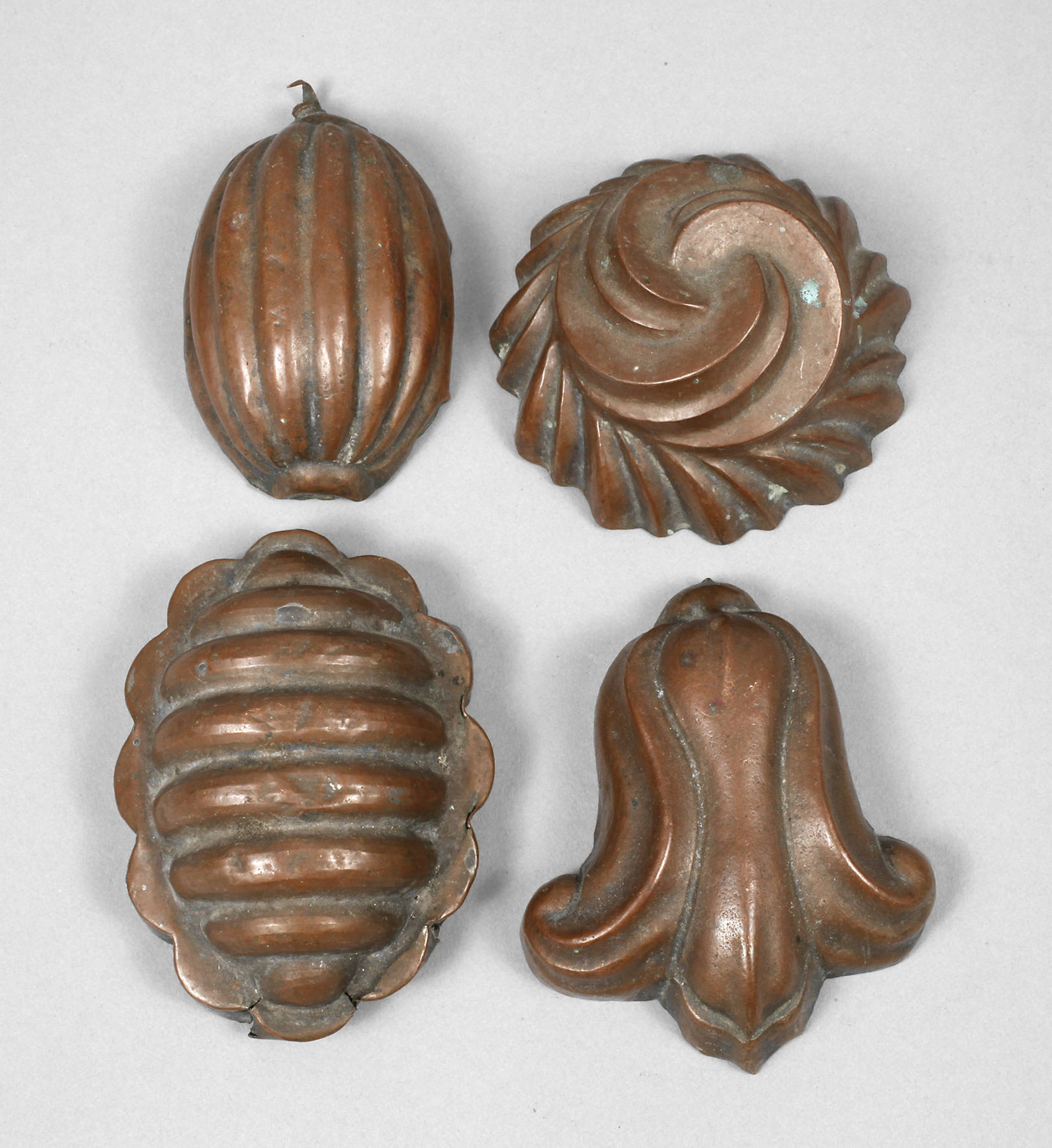 Vier kleine Kupfermodel