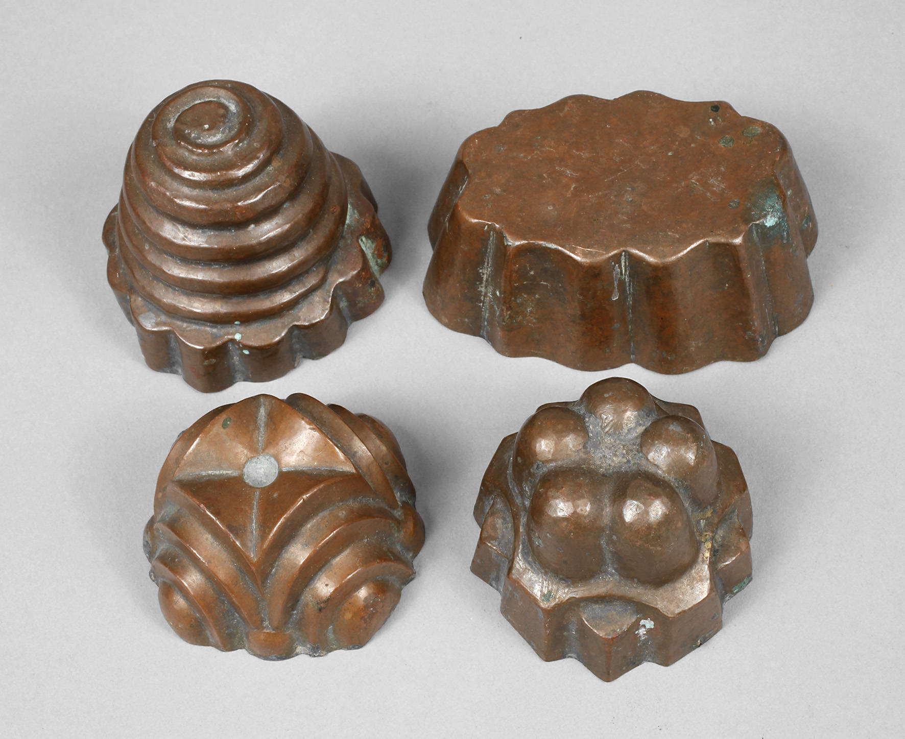 Vier kleine Kupfermodel