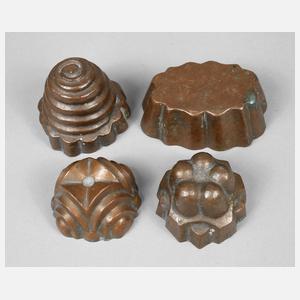 Vier kleine Kupfermodel