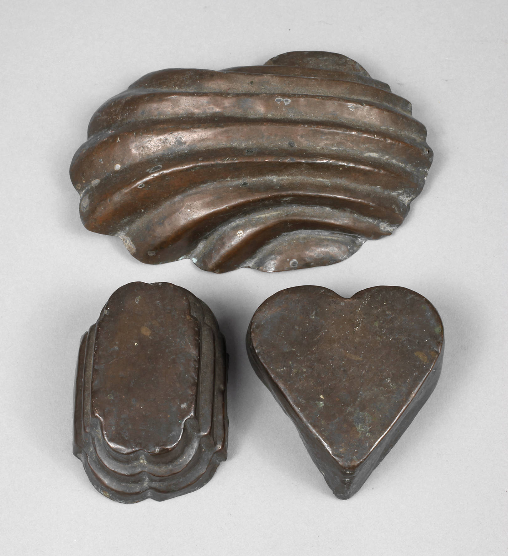 Drei kleine Kupfermodel