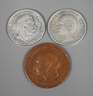 Drei Münzen