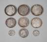 Neun Reichsmünzen