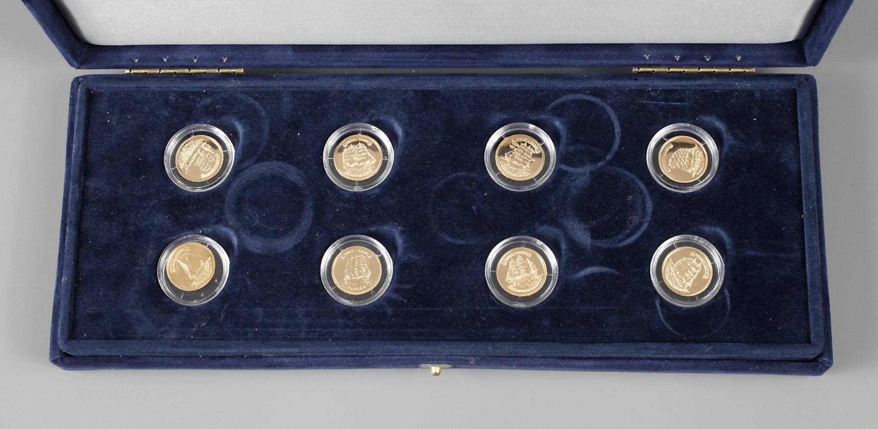 Acht Sammelmünzen Gold