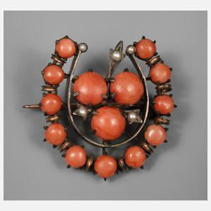 Korallenbrosche in Hufeisenform