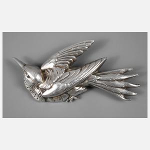 Brosche als fliegender Vogel