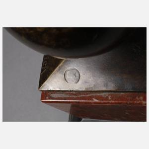 Amor auf einer Kugel