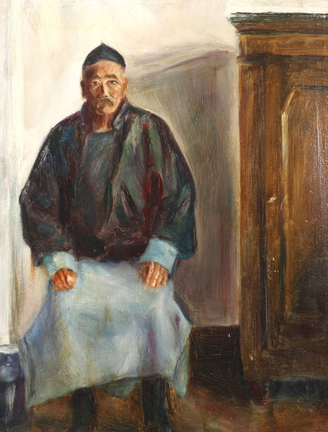 Portrait eines sitzenden Chinesen