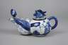 Figürliche Teekanne