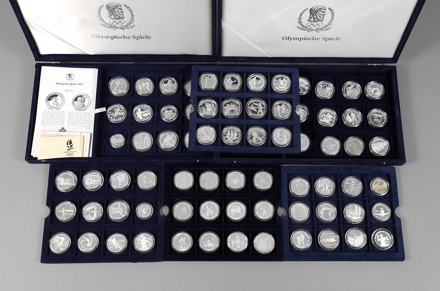 Zwei Münzsammelkisten Olympische Spiele