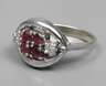 Damenring besetzt mit Rubinen und Diamanten