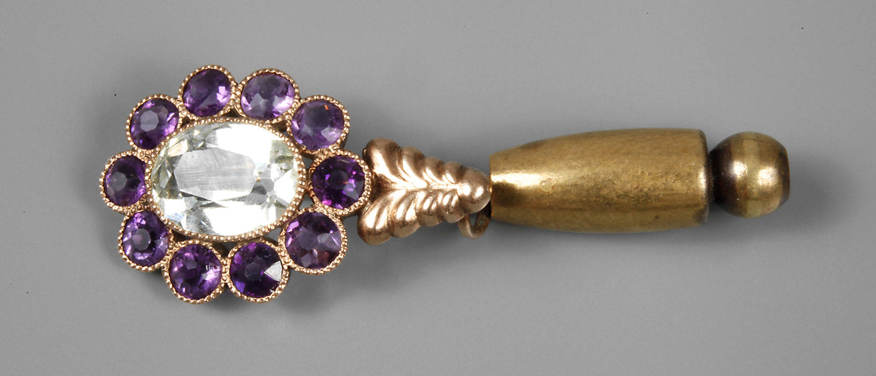 Reversnadel mit Amethysten und Aquamarin