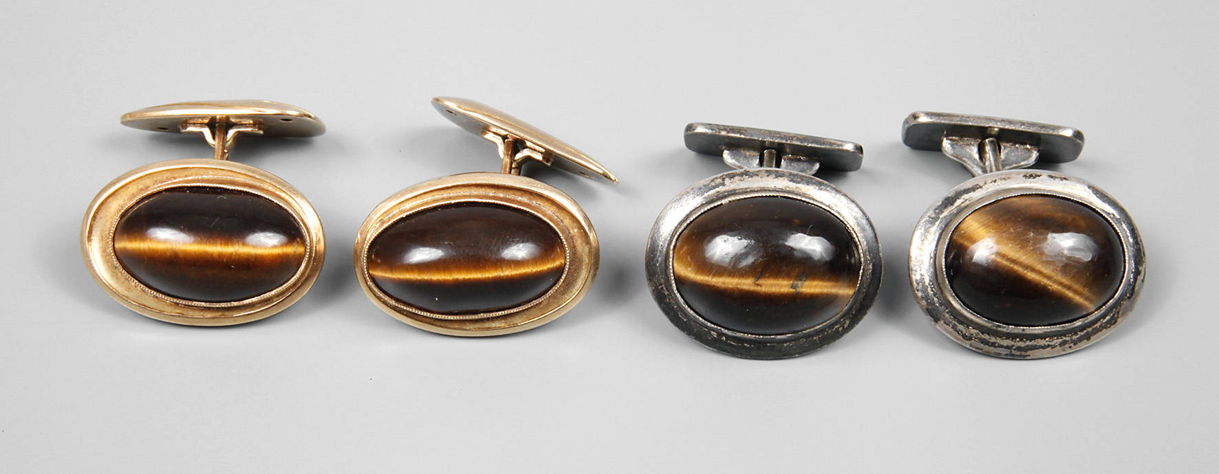 Zwei Paar Manschettenknöpfe mit Tigeraugen