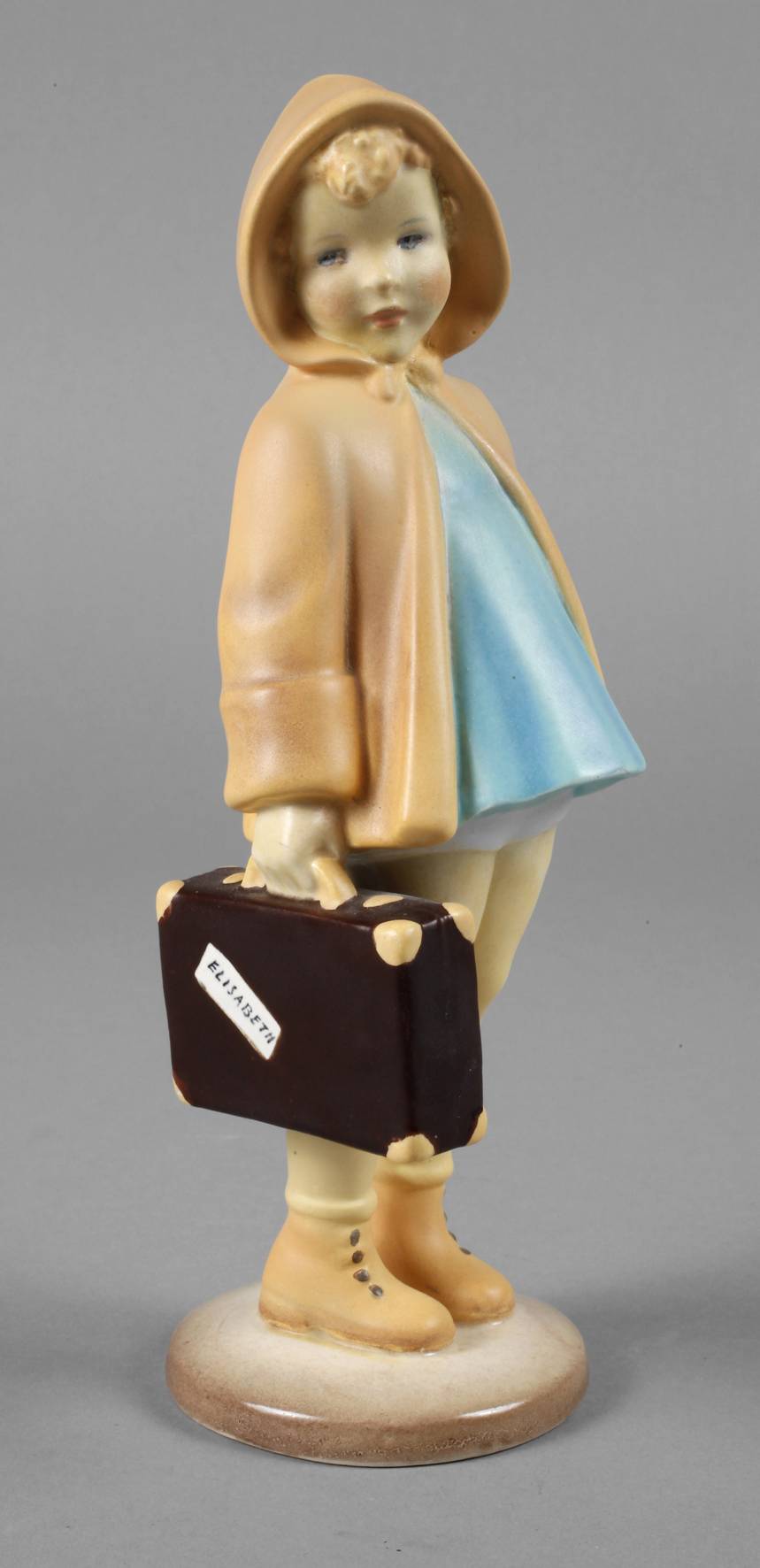 Keramos Wien Mädchen mit Koffer