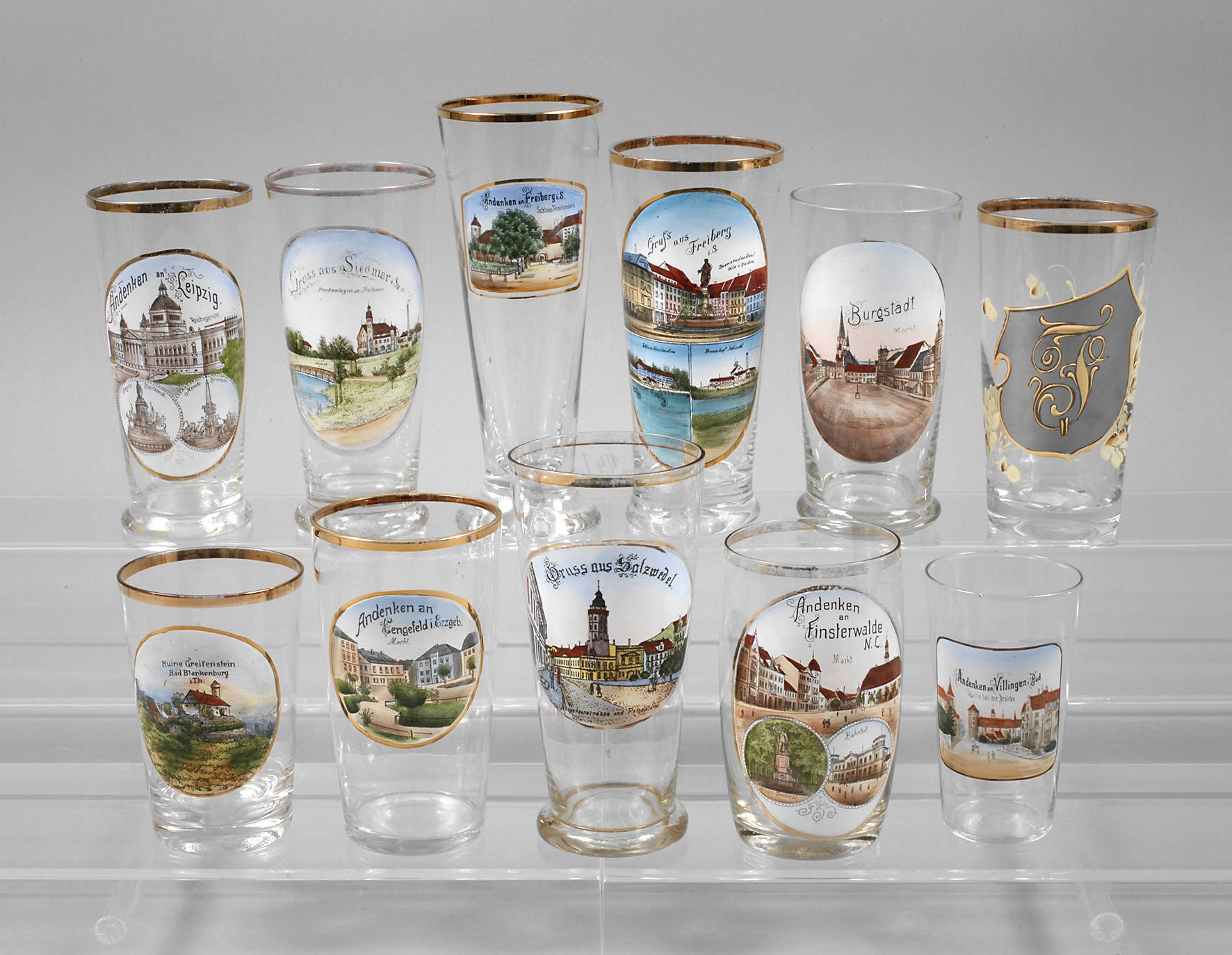 Elf Andenkengläser