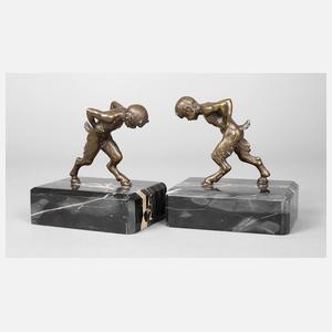 Paar Buchstützen als Faune