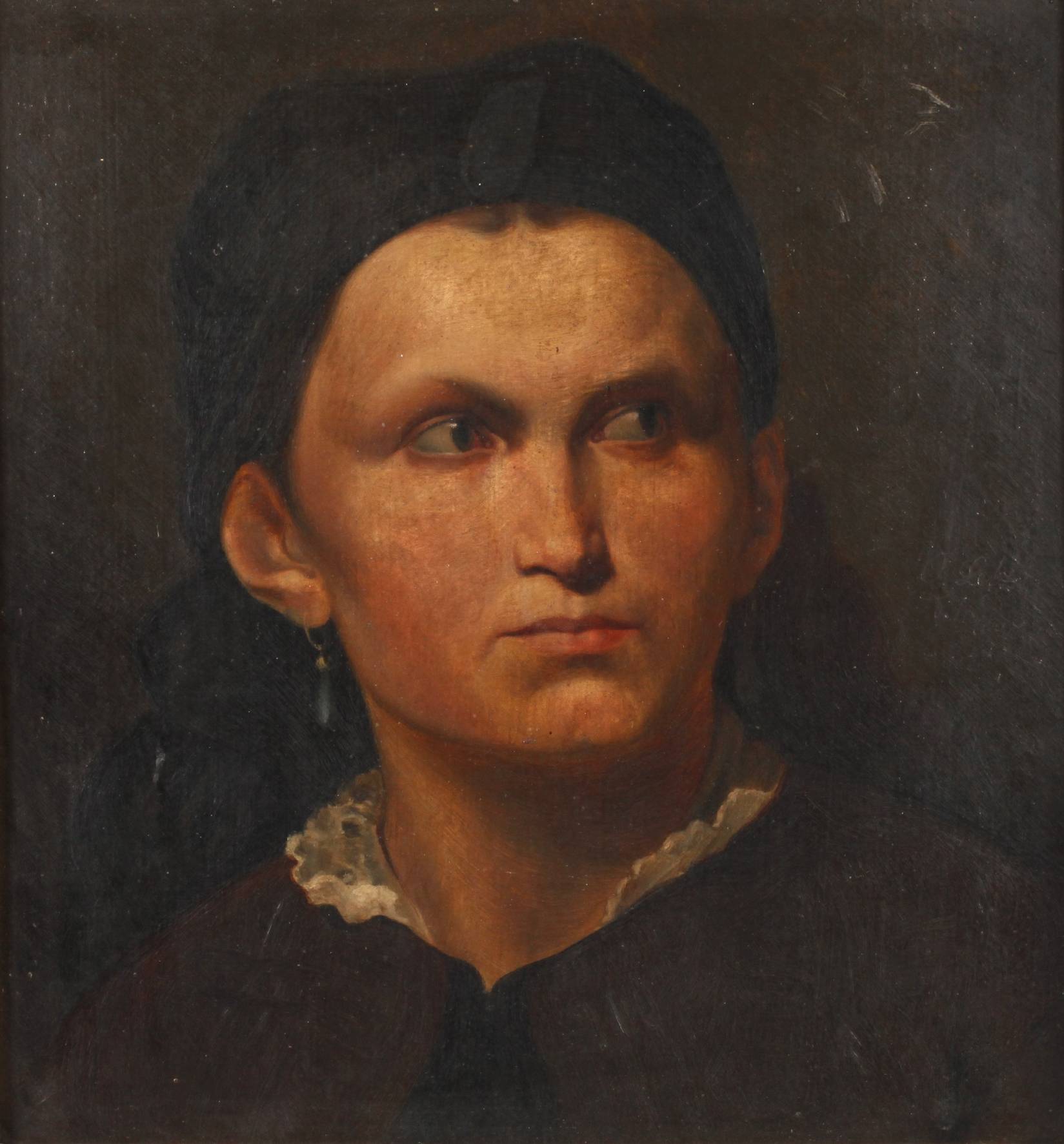 Portrait einer Frau mit Ohrringen