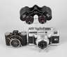 Zwei Kameras und Fernglas
