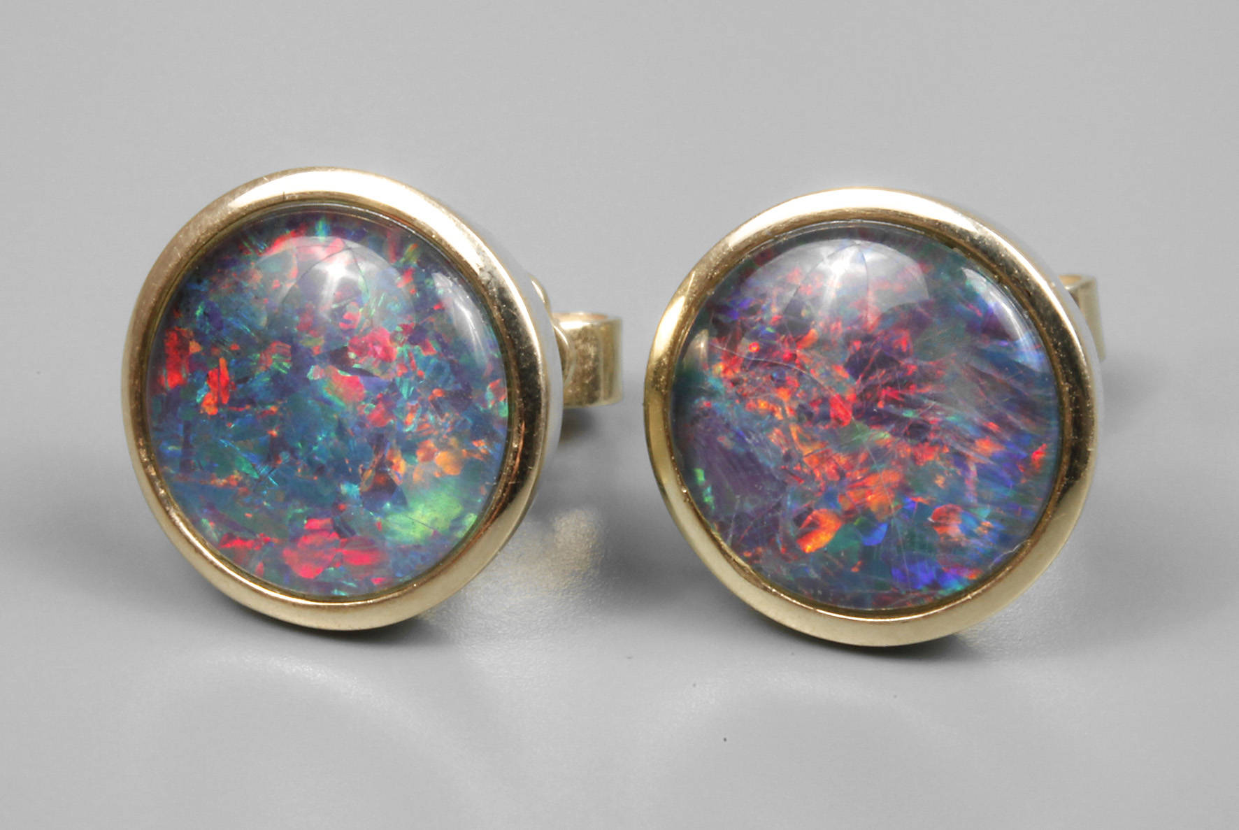 Paar Ohrstecker mit Opaltripletten