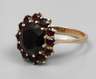 Damenring mit Granatbesatz