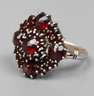 Damenring mit Granatbesatz