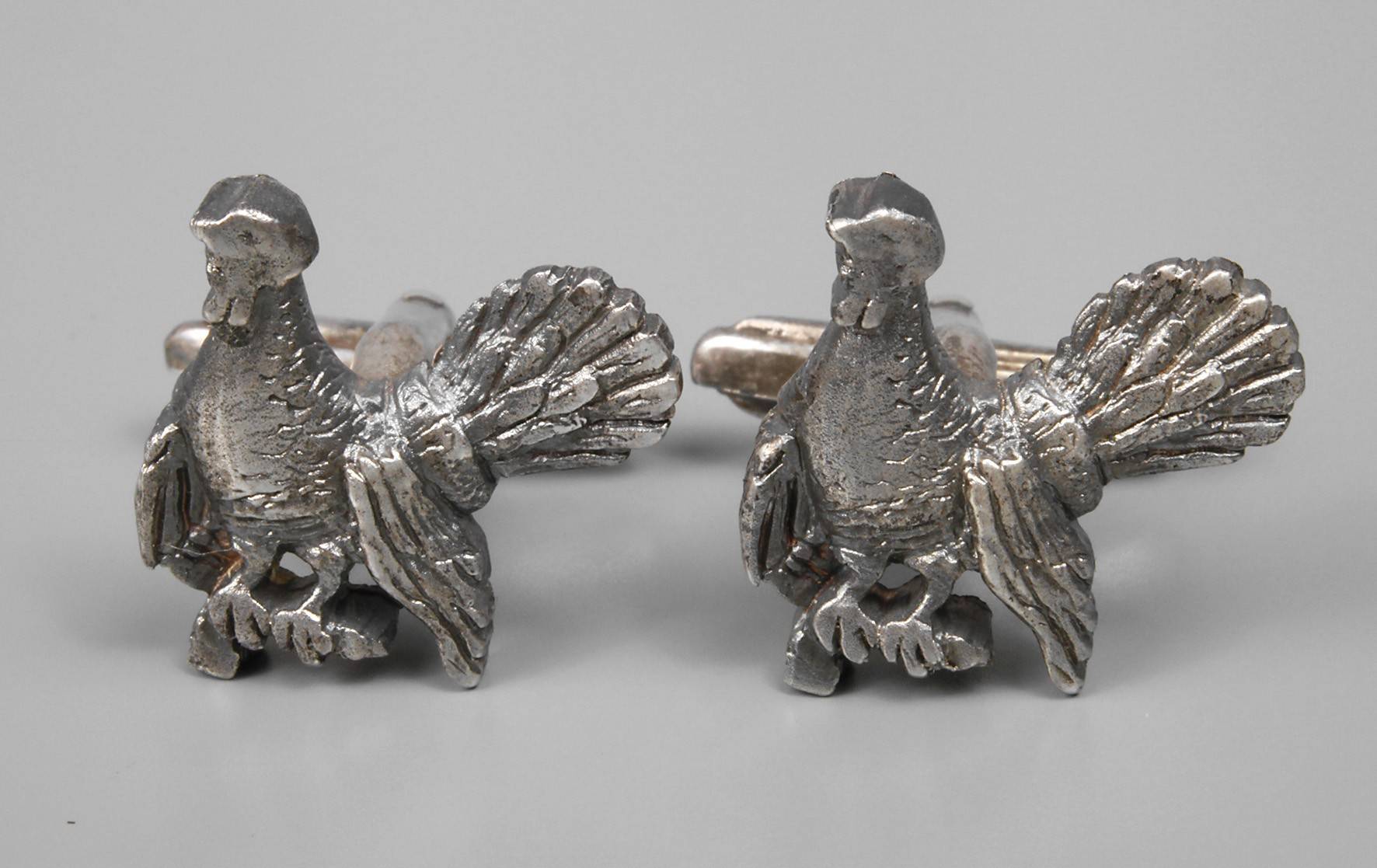 Paar jagdliche Manschettenknöpfe