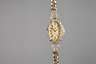 Goldene Damenarmbanduhr mit Diamantbesatz