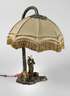 Figürliche Tischlampe