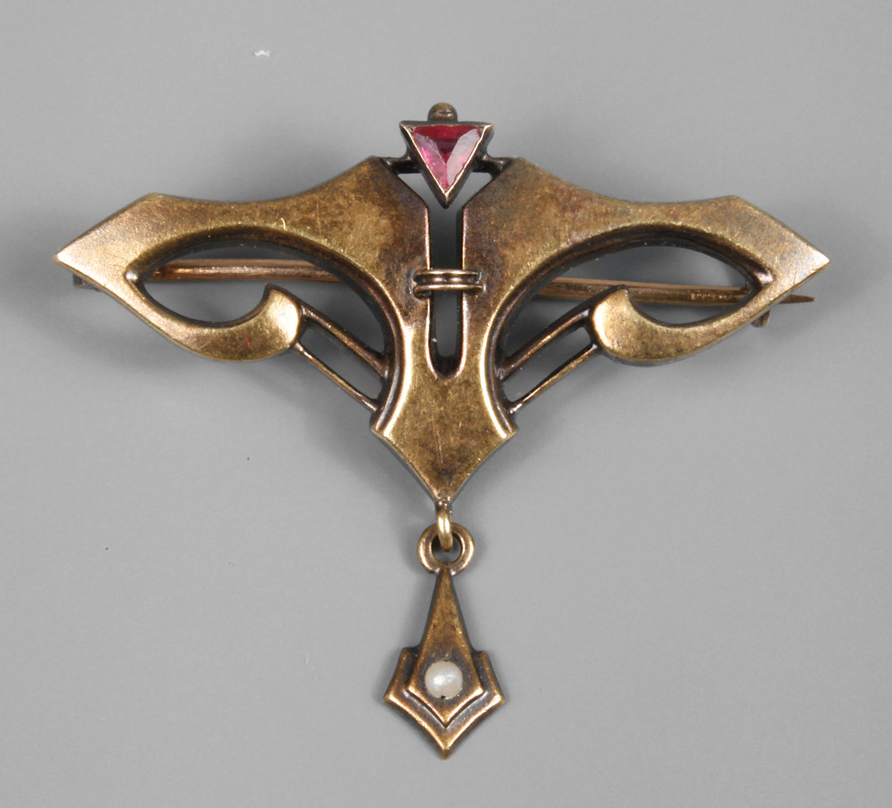 Goldbrosche mit Steinbesatz