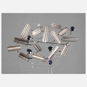 Brosche mit Saphiren und Brillant