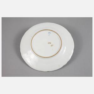 Fayenceteller mit Blütenmotiv