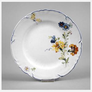 Fayenceteller mit Blütenmotiv