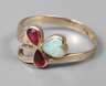Damenring mit Rubinen und Edelopal