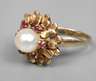 Damenring mit Perle und Rubinen
