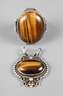 Zwei Teile Silberschmuck mit Tigerauge